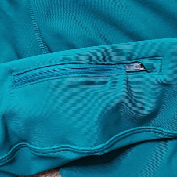 Nike Dri Fit Women's M Running Capris Cropped Green Teal Reflective Zip Pocket - Picture 4 of 8